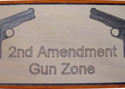 Wood sign depicting 2nd amendment gun rights, home gun protection, & perpetrator gun warning